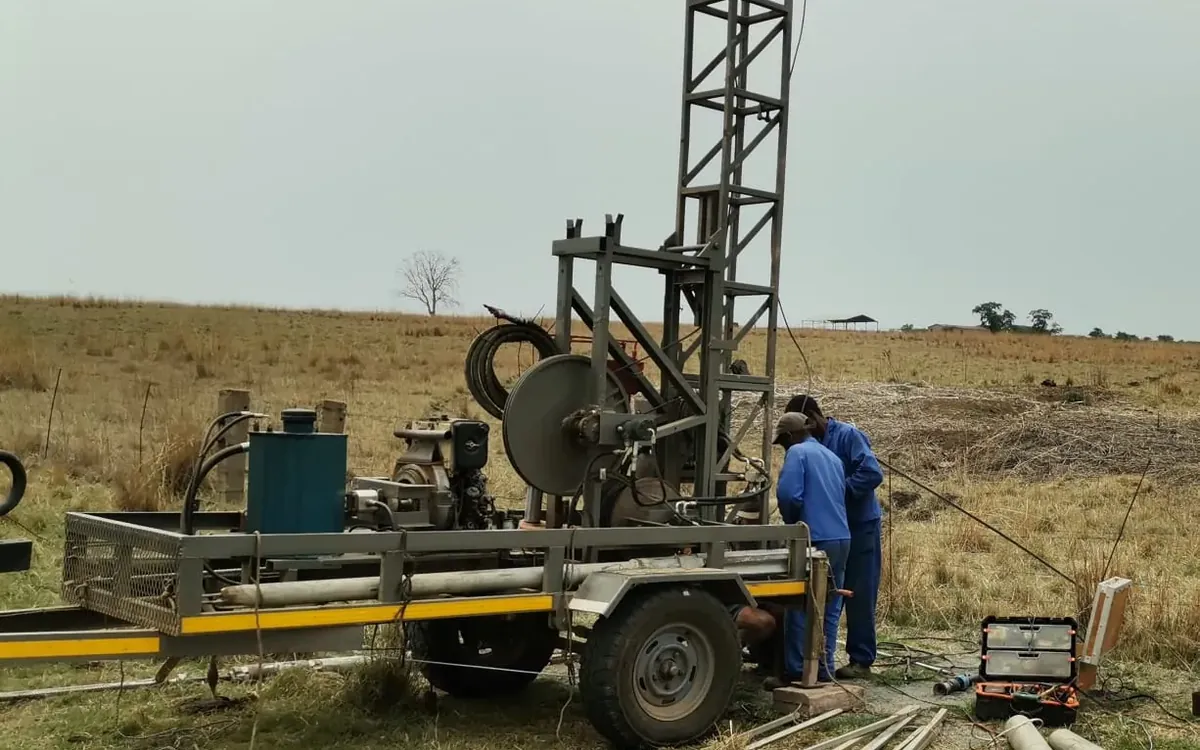 Our drilling rig and crew at a farm borehole