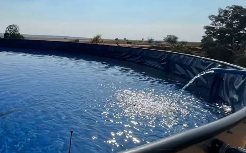 Sink dam with liner for water storage